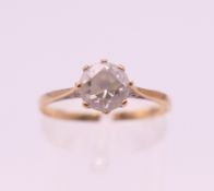A 9 ct gold cubic zirconia solitaire ring. Ring size P. 1.4 grammes total weight.
