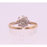 A 9 ct gold cubic zirconia solitaire ring. Ring size P. 1.4 grammes total weight.