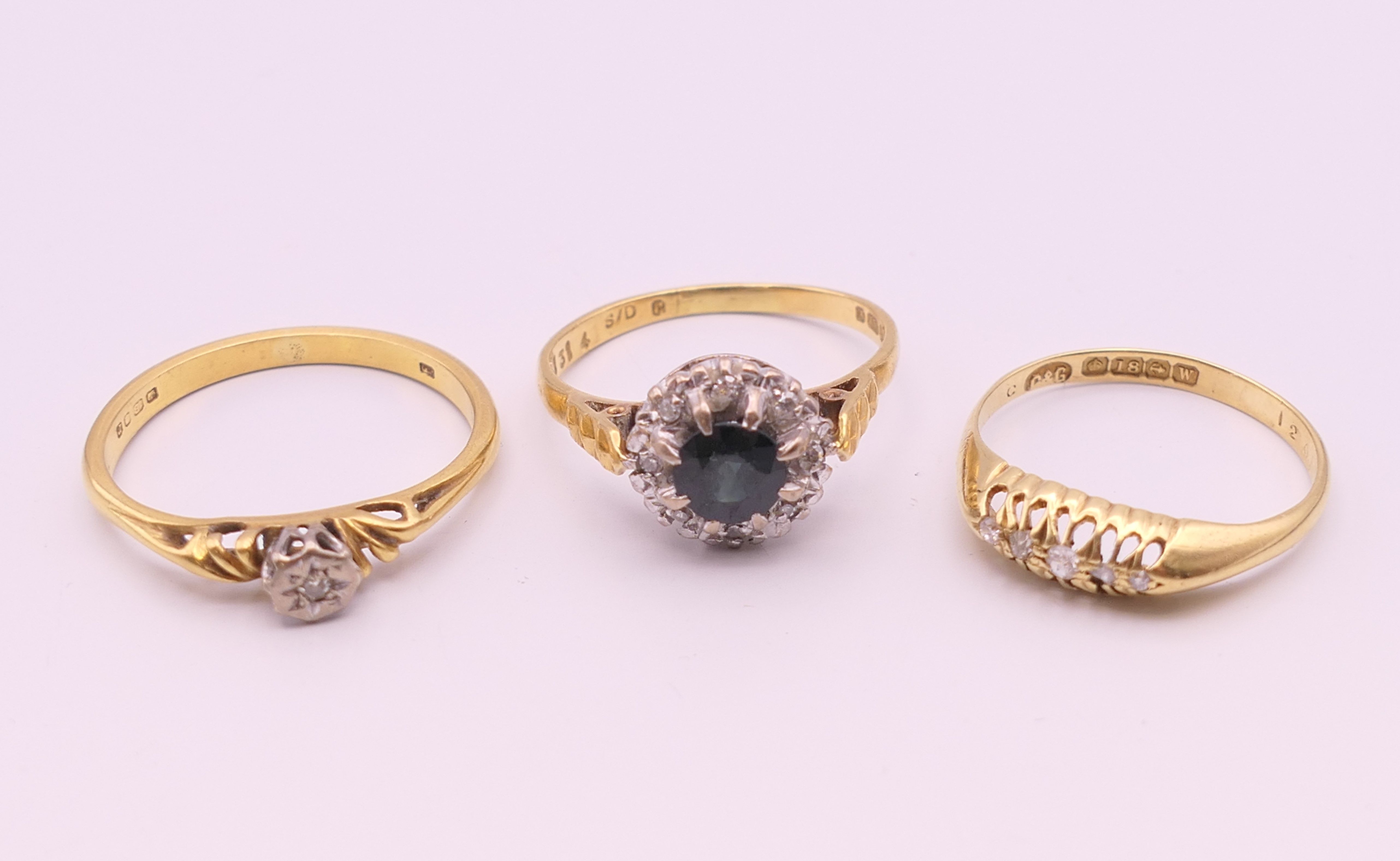 Three various 18 ct gold rings. 10 grammes total weight.