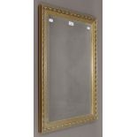 A modern wall mirror. 49 x 77.5 cm.