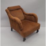 A Victorian brown upholstered armchair. 65 cm wide.