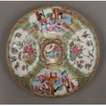 A 19th century Chinese famille rose plate. 22 cm diameter.