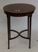 A Victorian mahogany occasional table. 53 cm diameter.