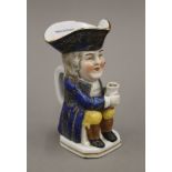 A Toby jug with gold anchor mark to back. 13 cm high.