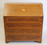 An Edwardian inlaid mahogany bureau. 90 cm wide.