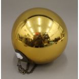 A 19th century gilt glass witches ball. Approximately 25 cm high.