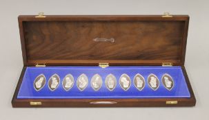 A boxed set of the Queens Silver Jubilee beasts plaques.