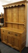 A modern oak dresser. Approximately 150 cm wide.