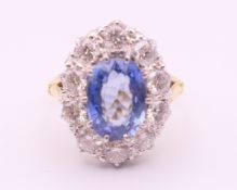 An 18 ct gold and platinum diamond and sapphire ring.