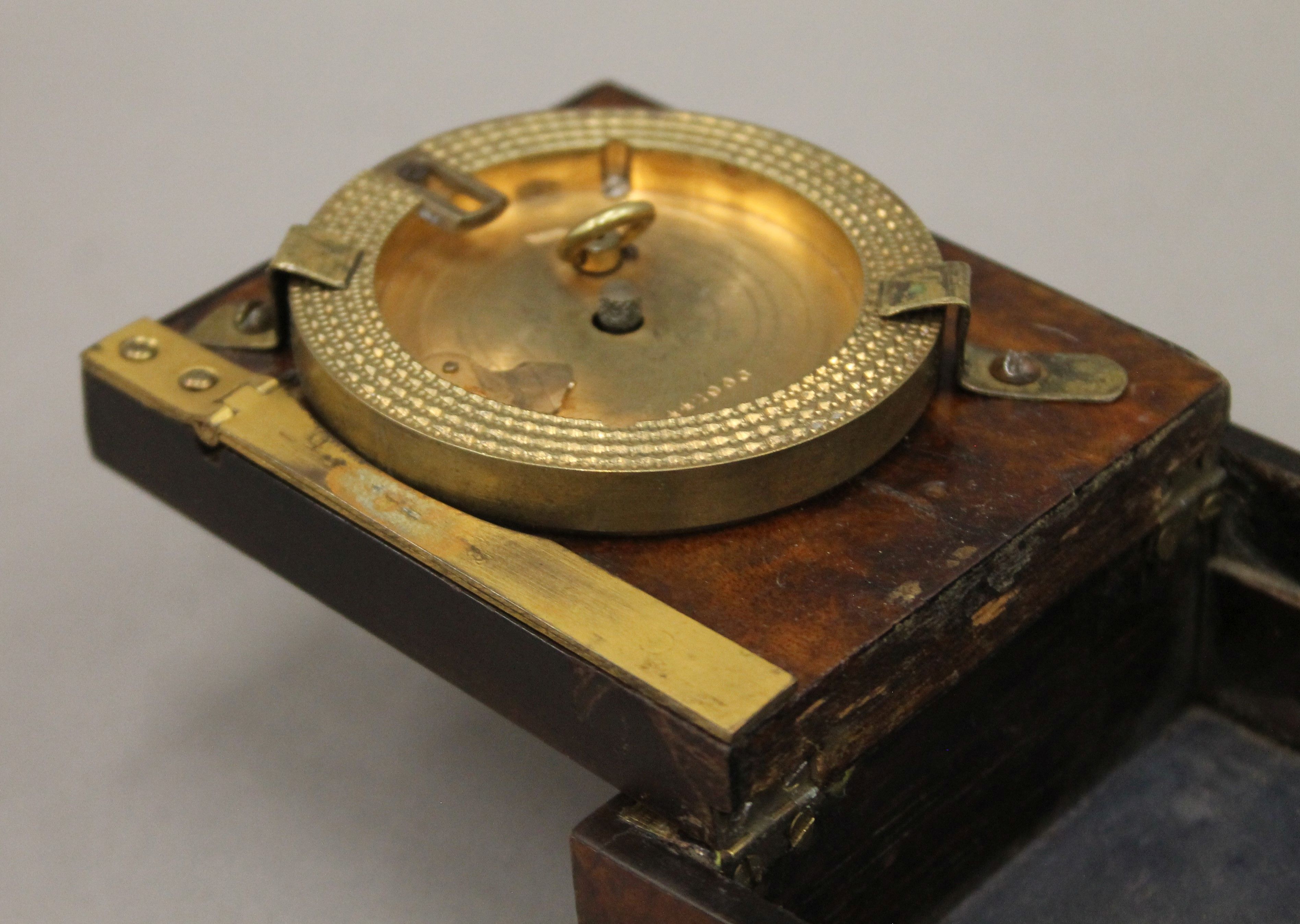 A 19th century brass mounted walnut cased travelling clock. The case 9 cm wide. - Image 6 of 6