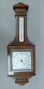 An oak barometer. 71 cm high.