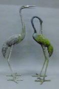Two garden models of storks. The largest 82 cm high.