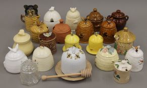 A collection of various honey pots.
