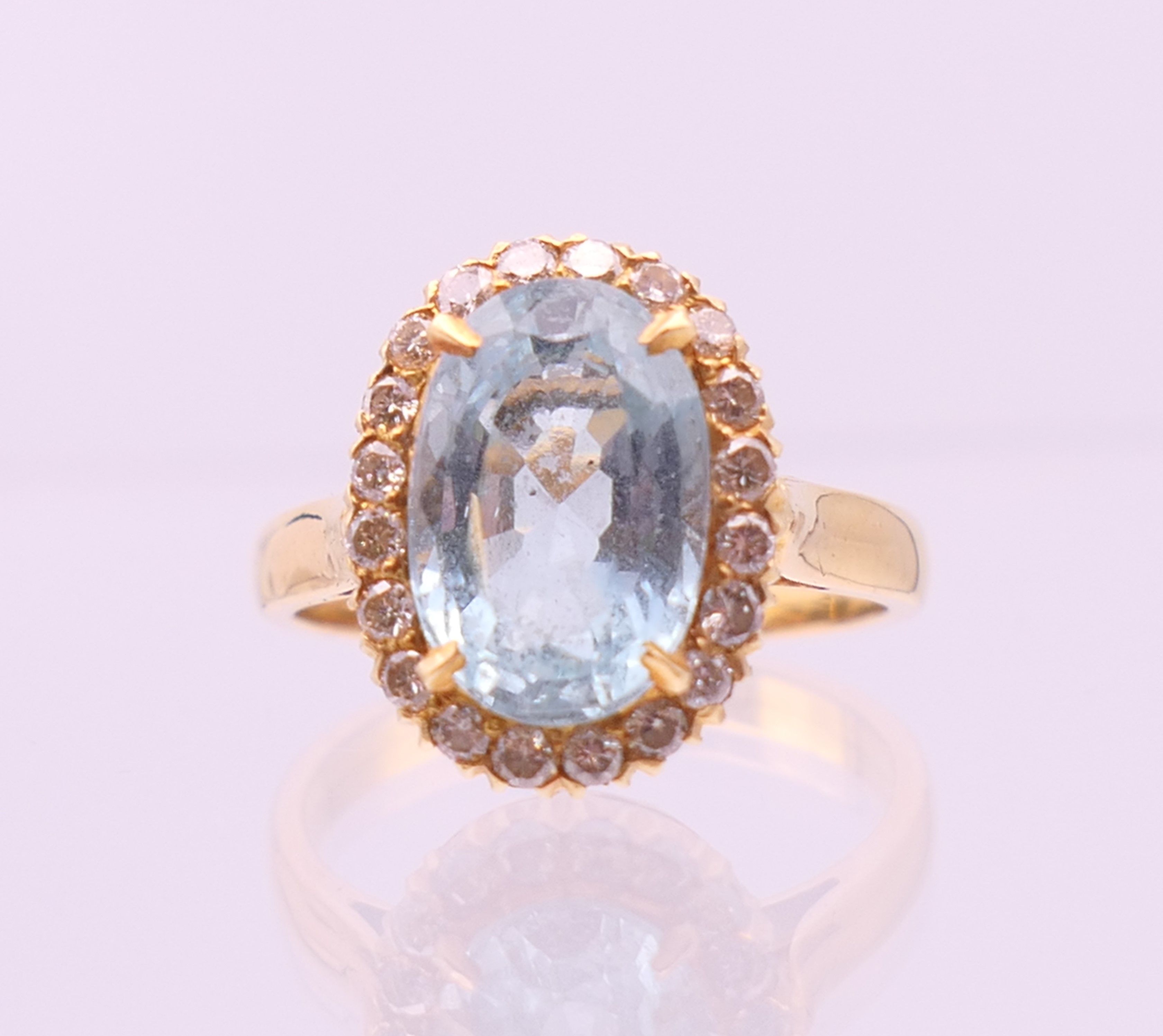 An 18 ct gold diamond and aquamarine ring. Ring size M/N. - Image 2 of 8