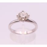 An 18 ct white gold diamond solitaire ring. Diamond weight approximately 1 carat. ring size N.