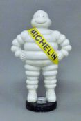 A cast iron Michelin man. 37.5 cm high.