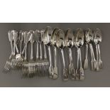 A six place setting of silver flatware. 1225.7 grammes.