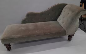 A Victorian green upholstered mahogany chaise lounge. Approximately 92 cm long.
