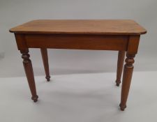A mahogany side table. 90 cm long.