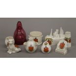 A quantity of various Ely crested ware and two cranberry vessels.