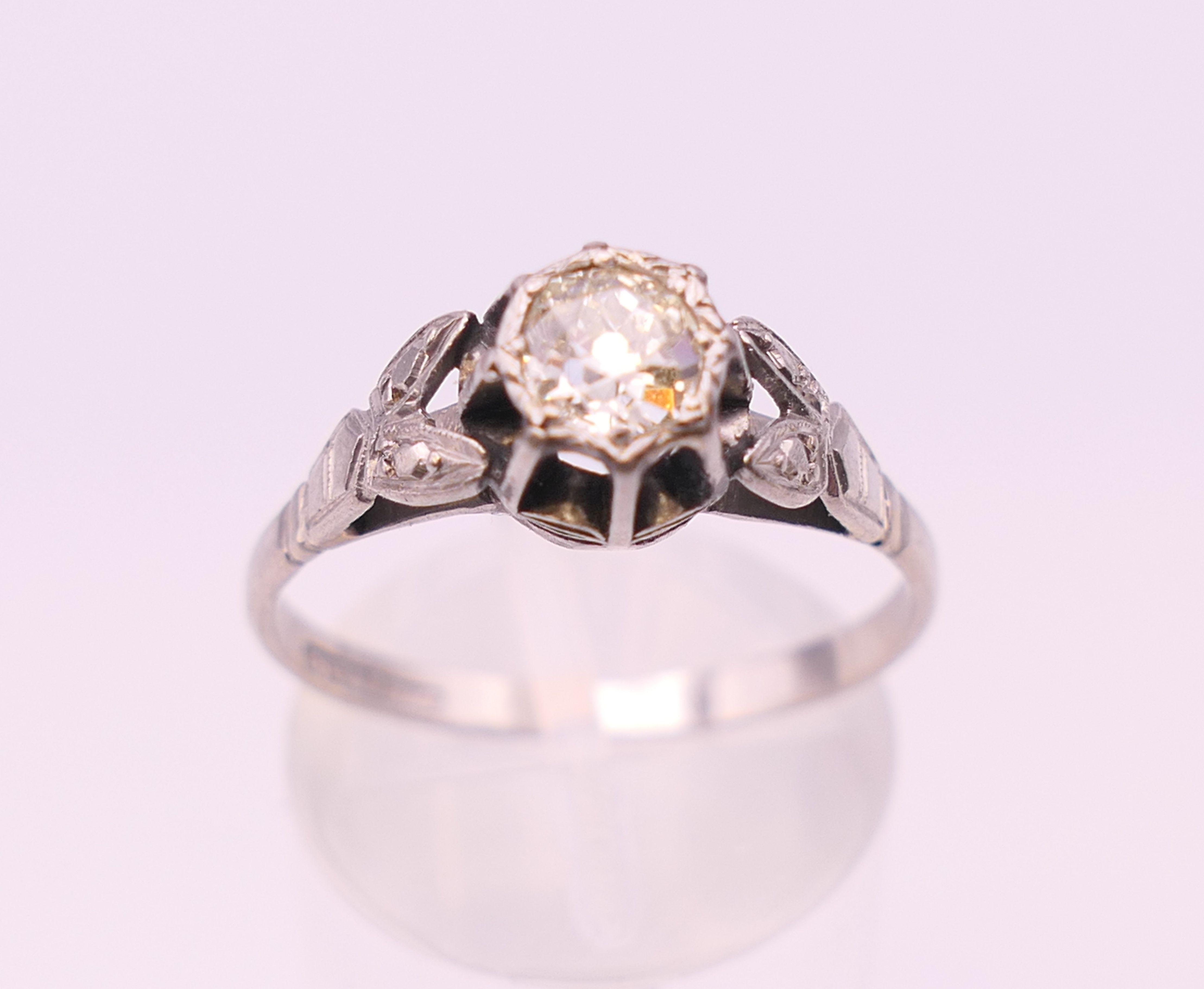 An 18 ct white gold and platinum diamond solitaire ring. The central approximately .5 carat. - Image 3 of 6