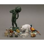 A Royal Copenhagen pig, a Beswick pheasant, Wade Whimsies and a Danish model of a girl, etc.