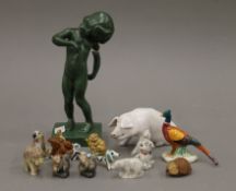 A Royal Copenhagen pig, a Beswick pheasant, Wade Whimsies and a Danish model of a girl, etc.