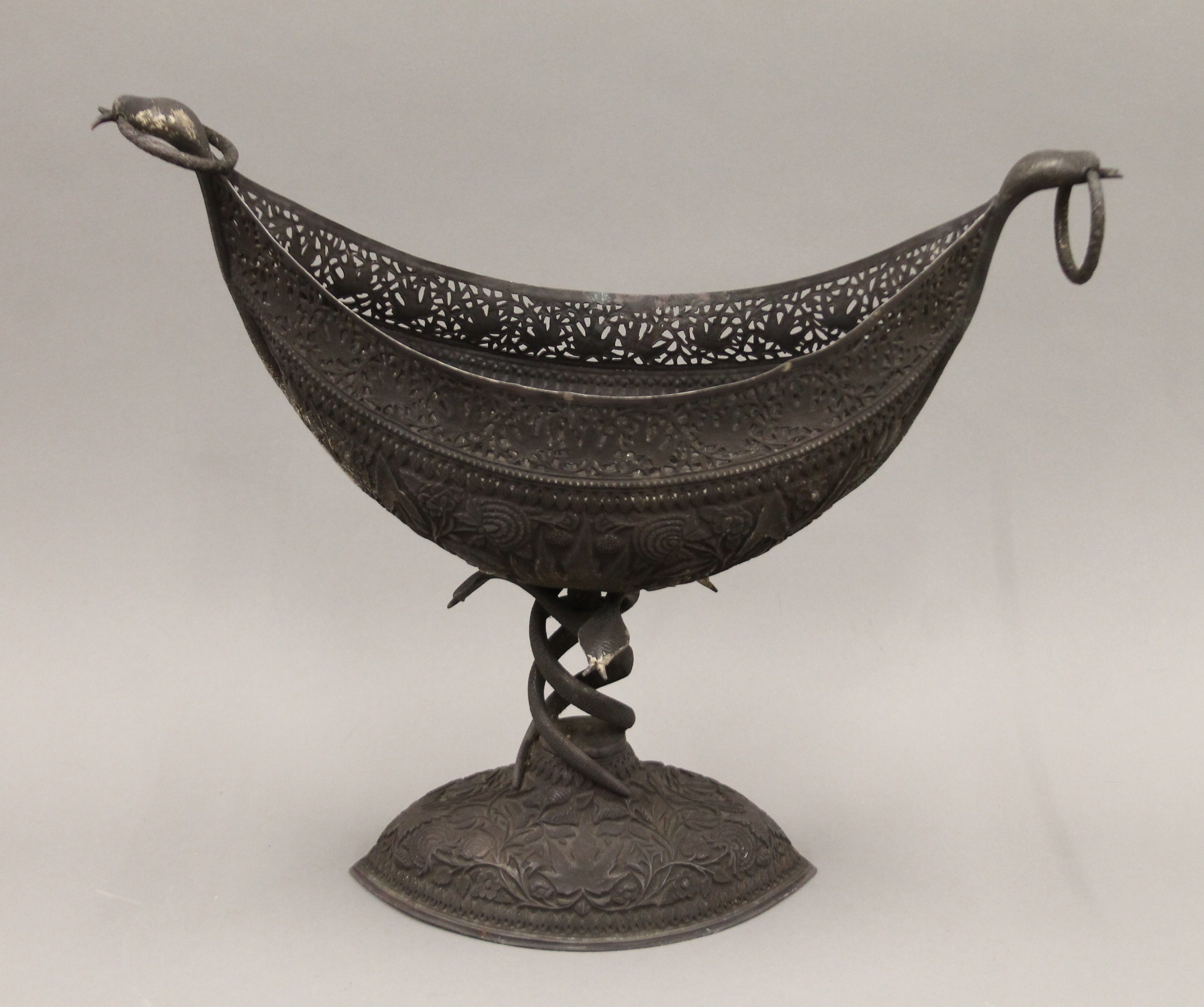 A large Indian embossed silver centre piece. 42 cm wide. 1849.3 grammes.