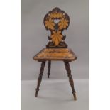 A 19th century penwork hall chair. 43 cm wide.