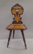 A 19th century penwork hall chair. 43 cm wide.