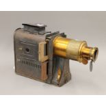 A metamorphic magic lantern projector. 51 cm long.