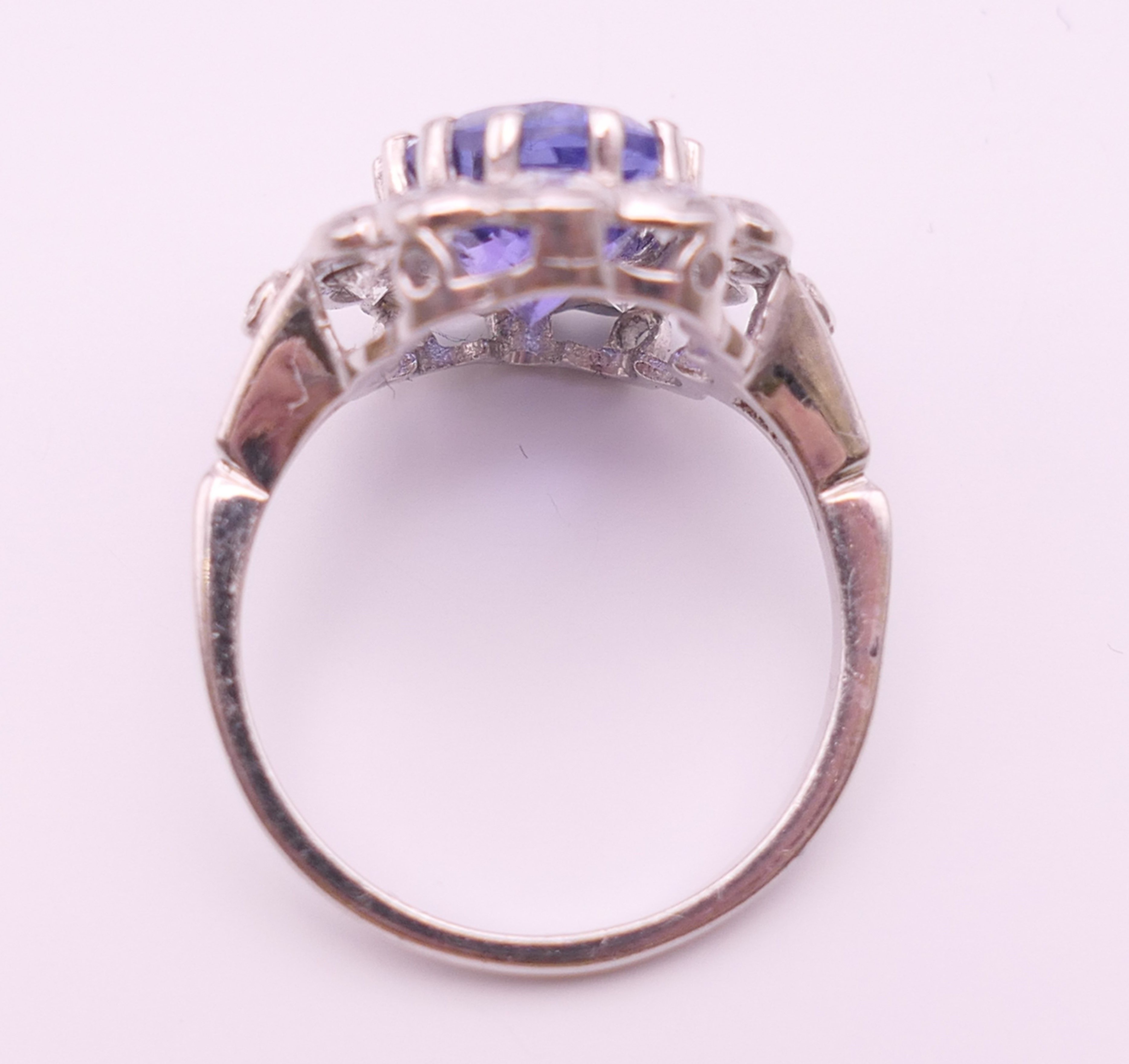 An 18 ct white gold ring with central tanzanite of 2. - Image 5 of 8
