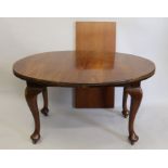 An early 20th century mahogany single leaf extending dining table.