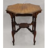 A Victorian walnut centre table.