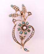 A 9 ct gold turquoise and pearl brooch. 5 cm high. 4.5 grammes total weight.