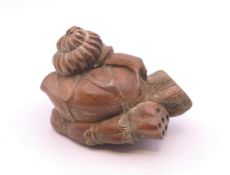 A netsuke in the form of a snail. 5 cm long.