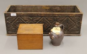 A vintage bottle of French Calvados and two wooden boxes