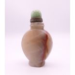A Chinese agate snuff bottle. 7.5 cm high.