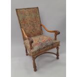 A 19th century tapestry covered walnut open armchair. 67 cm wide.