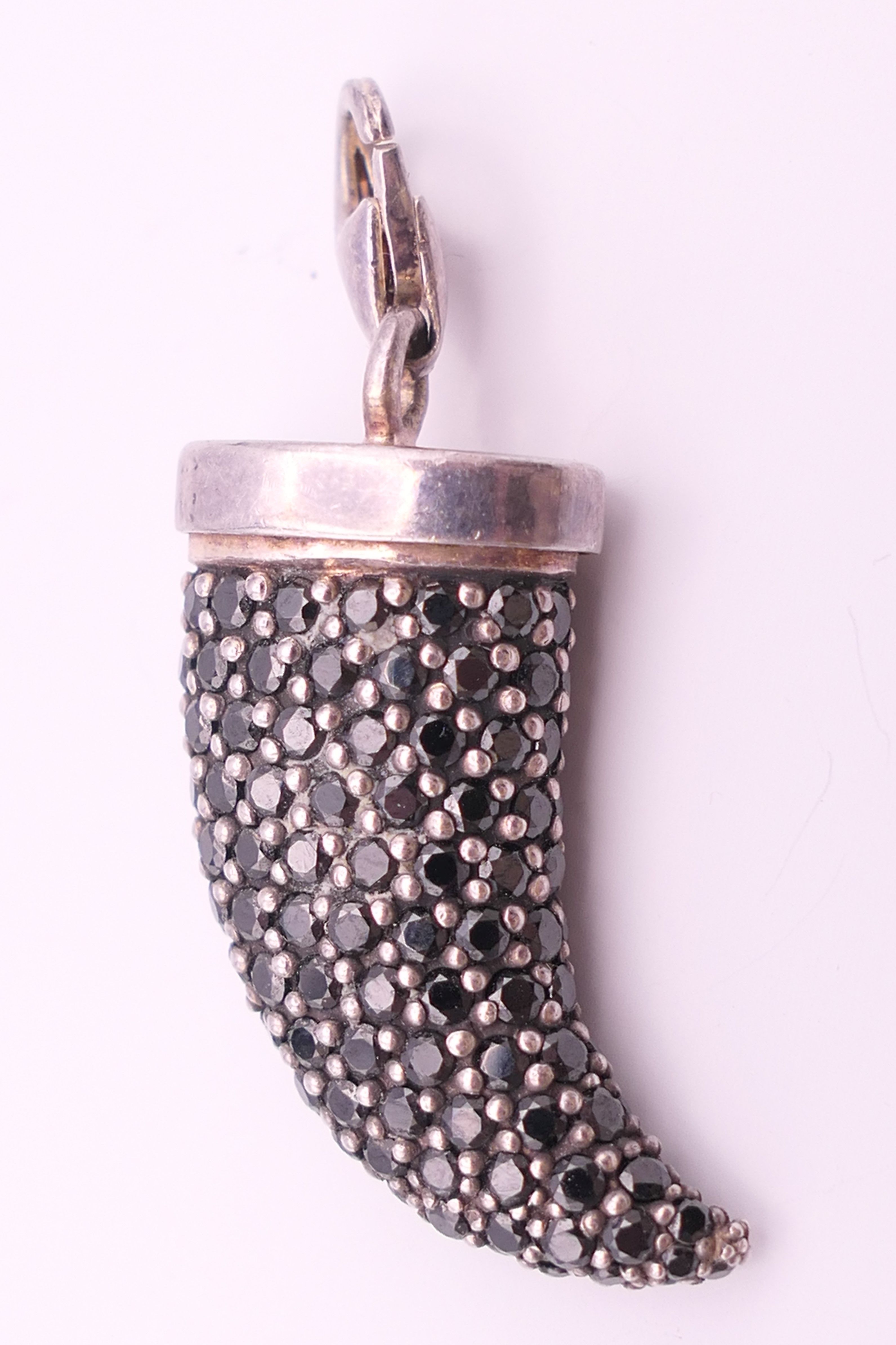 A silver gem set pendant. 2.25 cm high.