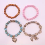 Four Chinese bracelets.