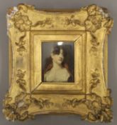 A print of a lady, housed in a 19th century gilt frame. 7 x 9 cm.