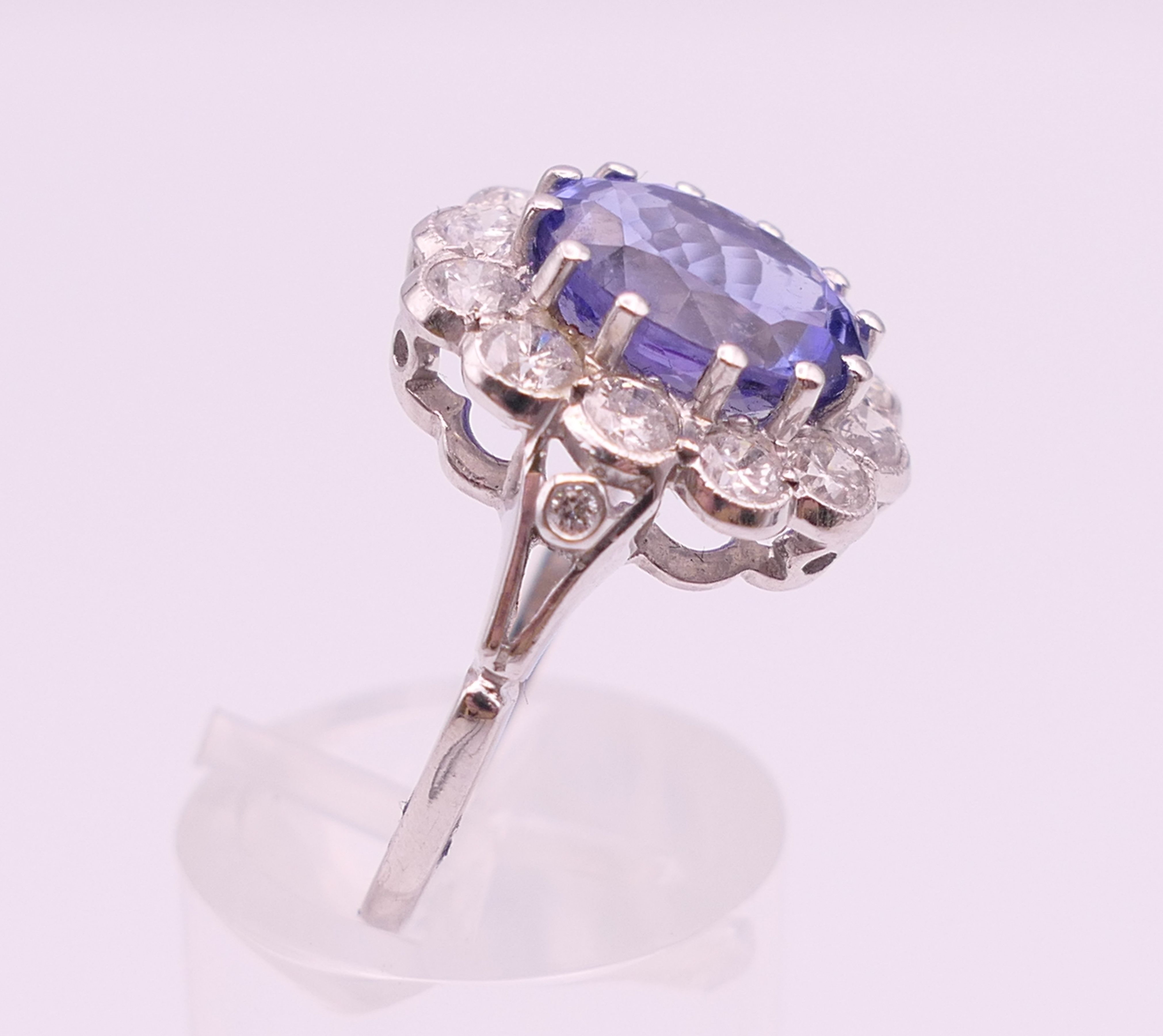 An 18 ct white gold ring with central tanzanite of 2. - Image 4 of 8