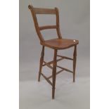 A Victorian clerks chair. 107 cm high.