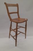 A Victorian clerks chair. 107 cm high.