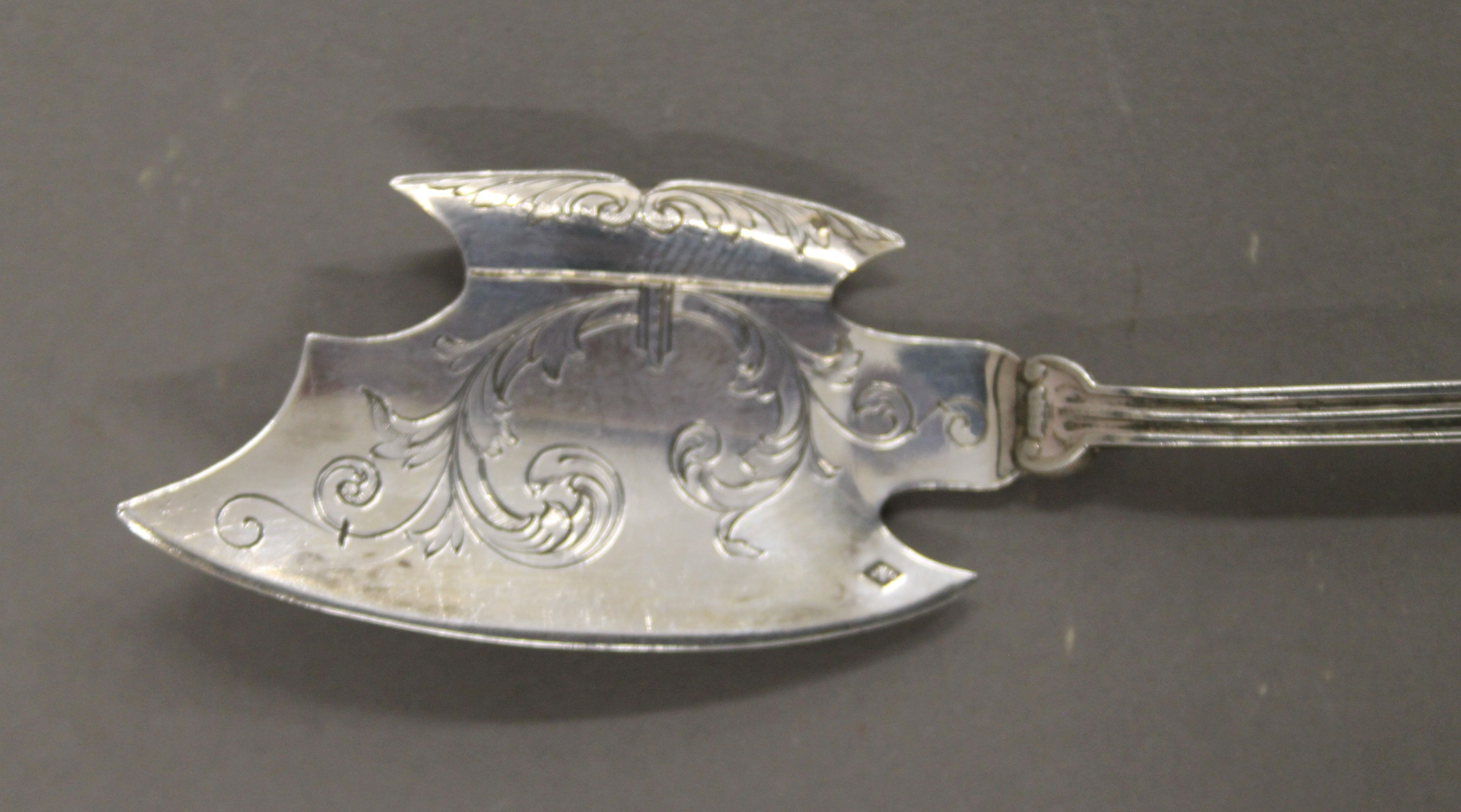 A set of four Continental pierced silver patisserie servers and eaters. The largest 17 cm long. 100. - Image 3 of 4