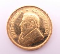 A 1985 1/10 gold Krugerrand. 3.4 grammes.