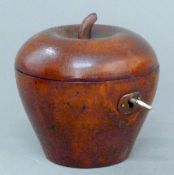 An apple form tea caddy. 11 cm high.