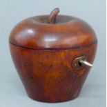 An apple form tea caddy. 11 cm high.