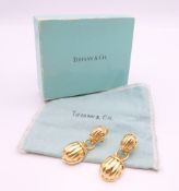 A pair of Tiffany & Co 18 ct gold scarab form earrings. 4.25 cm high. 23.6 grammes.